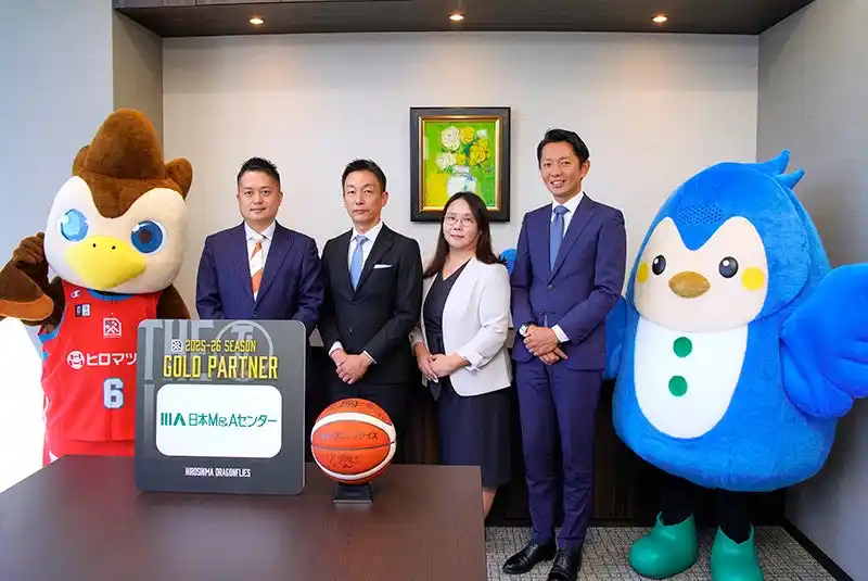 日本M&Aセンター、プロバスケットボールクラブ「広島ドラゴンフライズ」とゴールドパートナー契約