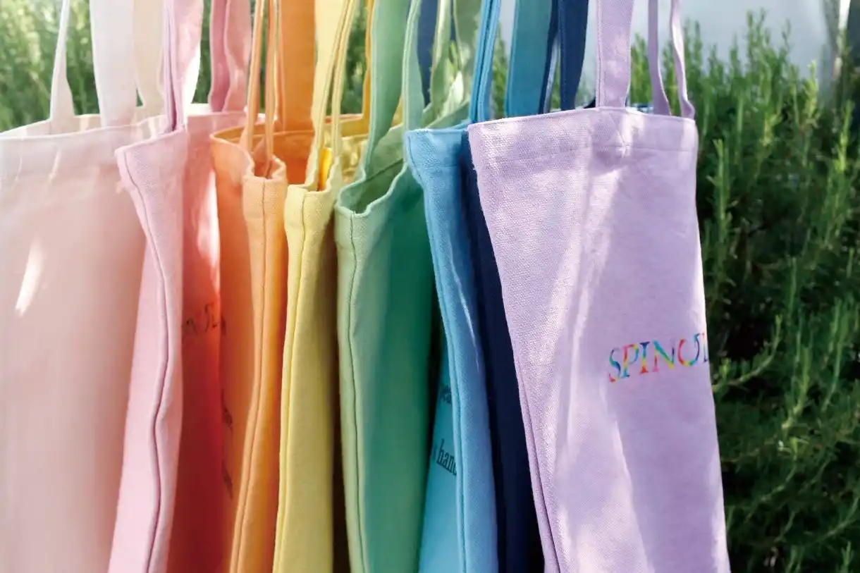 【株式会社スピングルカンパニー】 「折り鶴再生レーヨン糸」を活用したキャンバストートバッグを発売